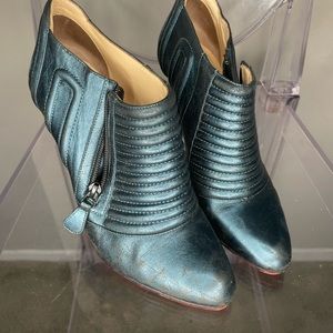 Christian Louboutin blue bootie.
